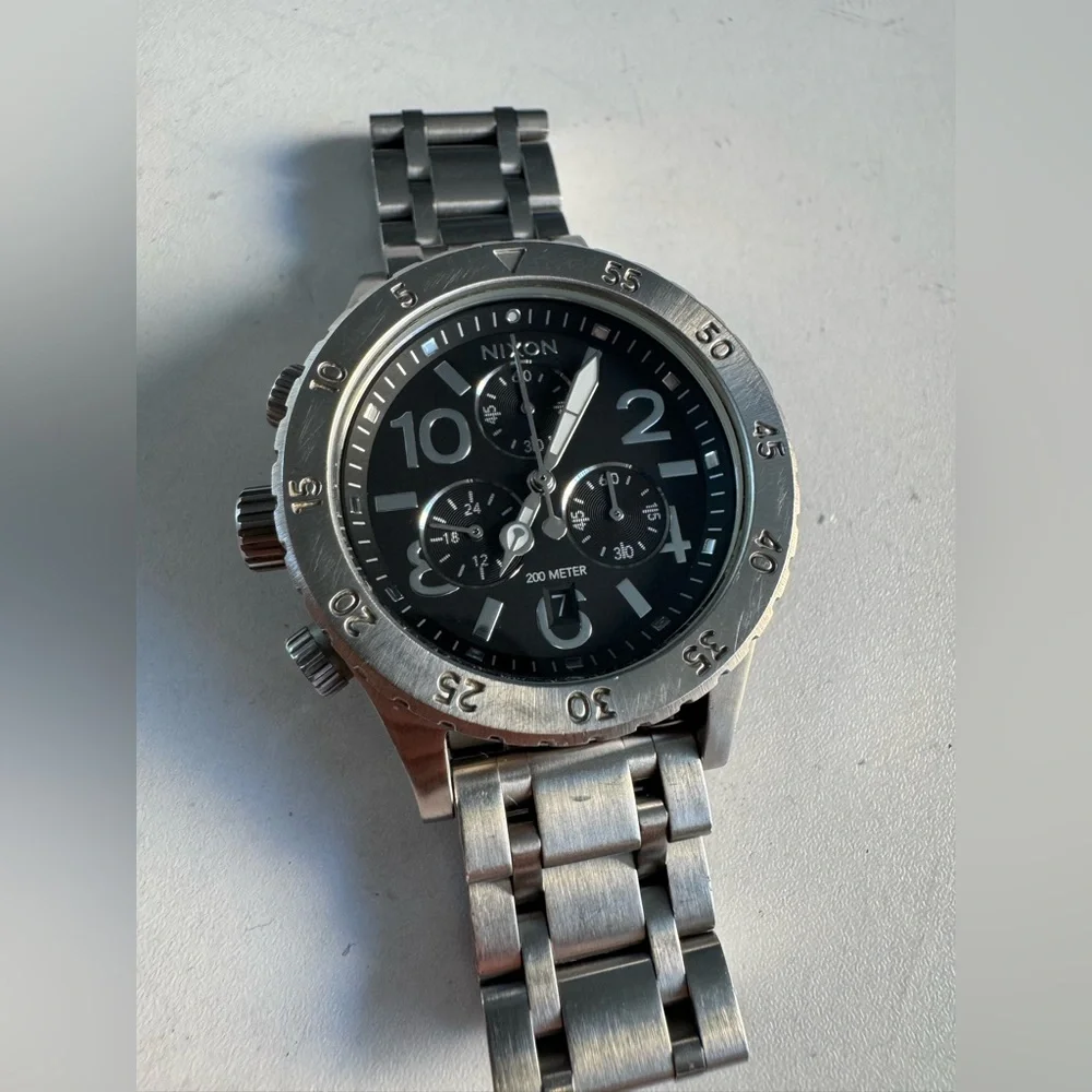Nixon Men's Silver Stainless Steel Chronograph Watch with Black Dial